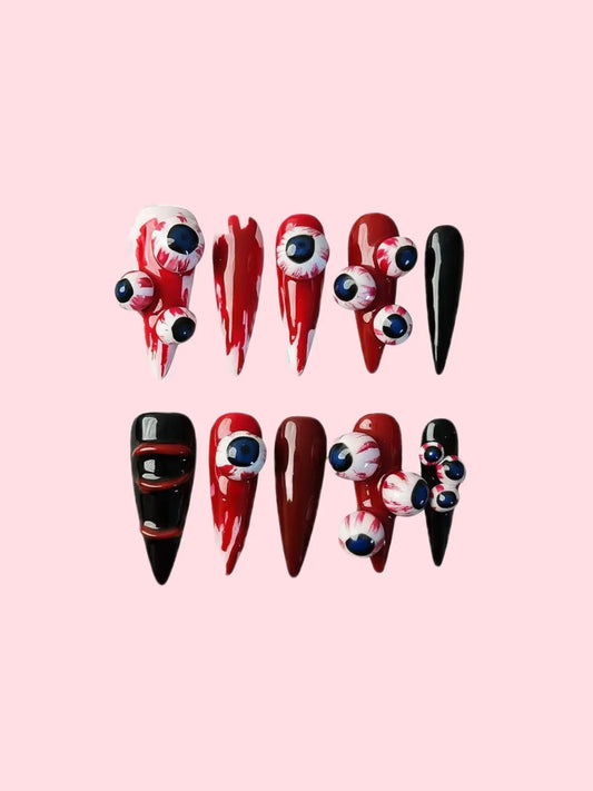 DRAMATIC RED STILETTOS.